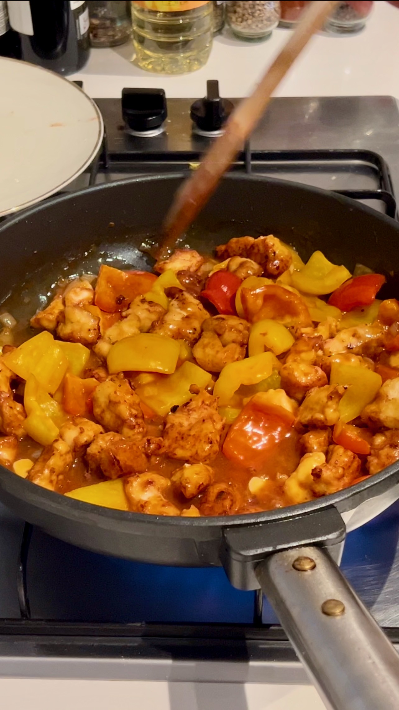 include chicken back to the pan and stir fry everything